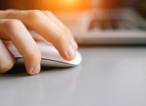 hand on computer mouse